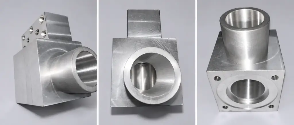 Three views of a machined metal component, shown side by side